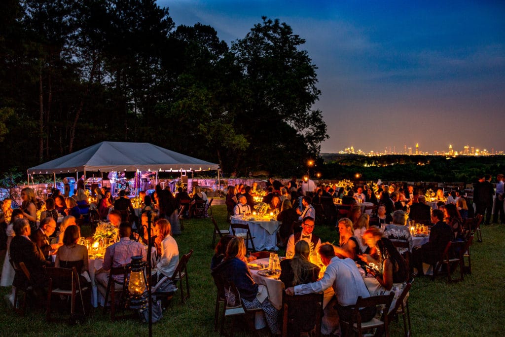 atlanta outdoor evening wedding reception dinner skyline buckhead photographer 1566